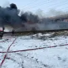 Foto FOTO&VIDEO. Vagonul unui tren de călători, cuprins de un incendiu în apropiere de Radomireşti. A fost activat Planul Roşu de intervenţie